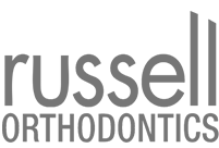 Russell Orthodontics logo showcasing client branding by eNox Media